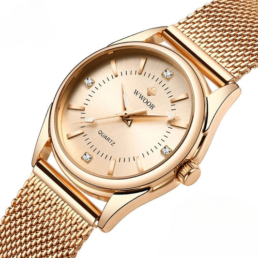 Montre de Luxe Femme en Or avec Diamants : Élégance et Style Impeccable