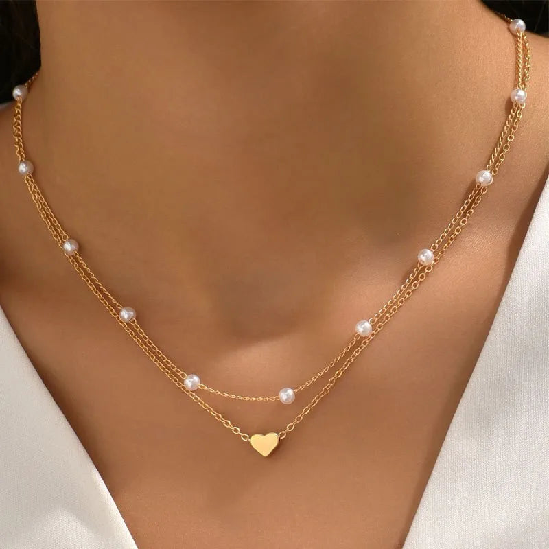 Women's Pearl Necklace Set with Gold Heart Pendant - Elegance and Trendy Style